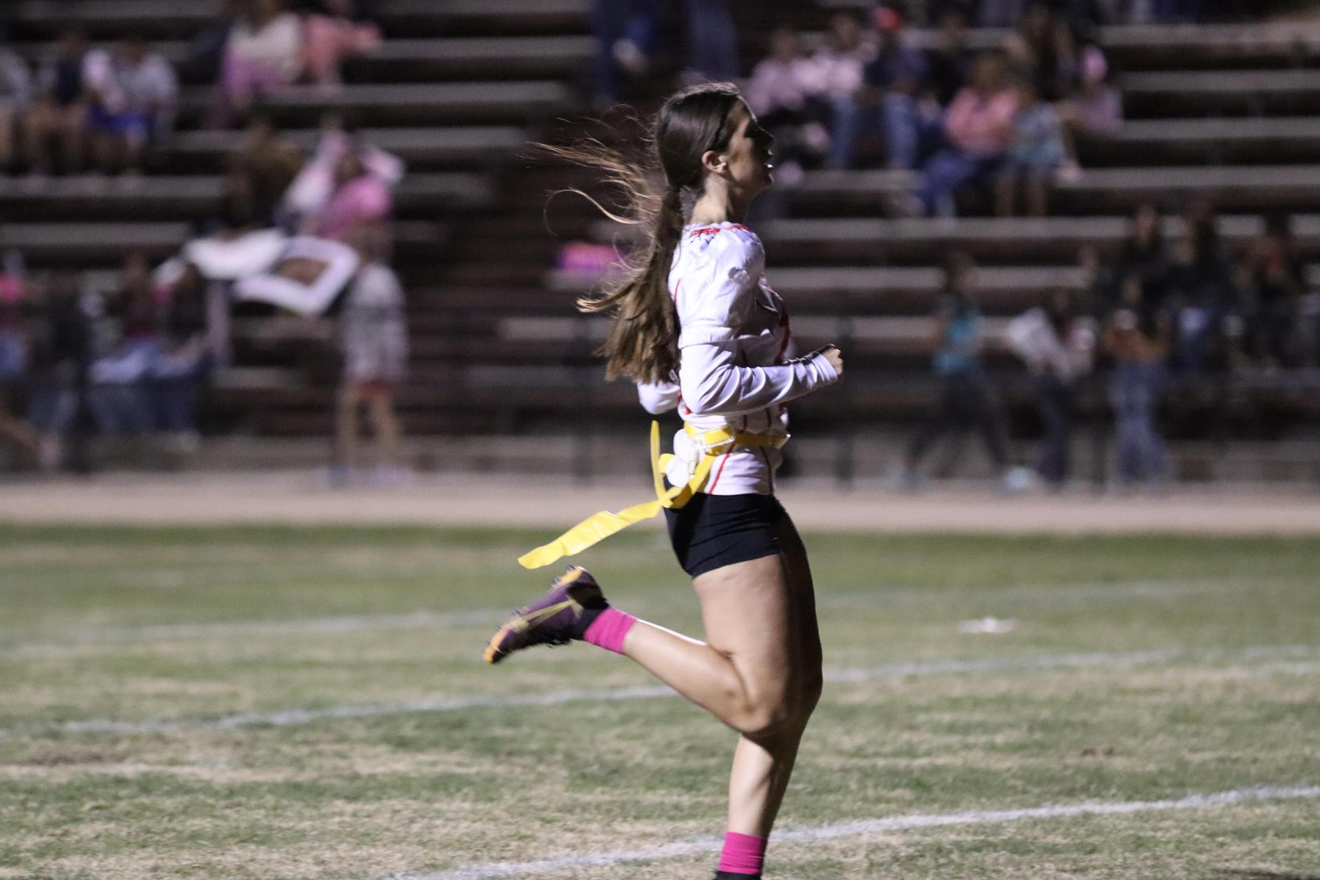 girls playing flag football
