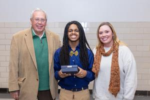 Xaiveyon poses for a photo with well wishers