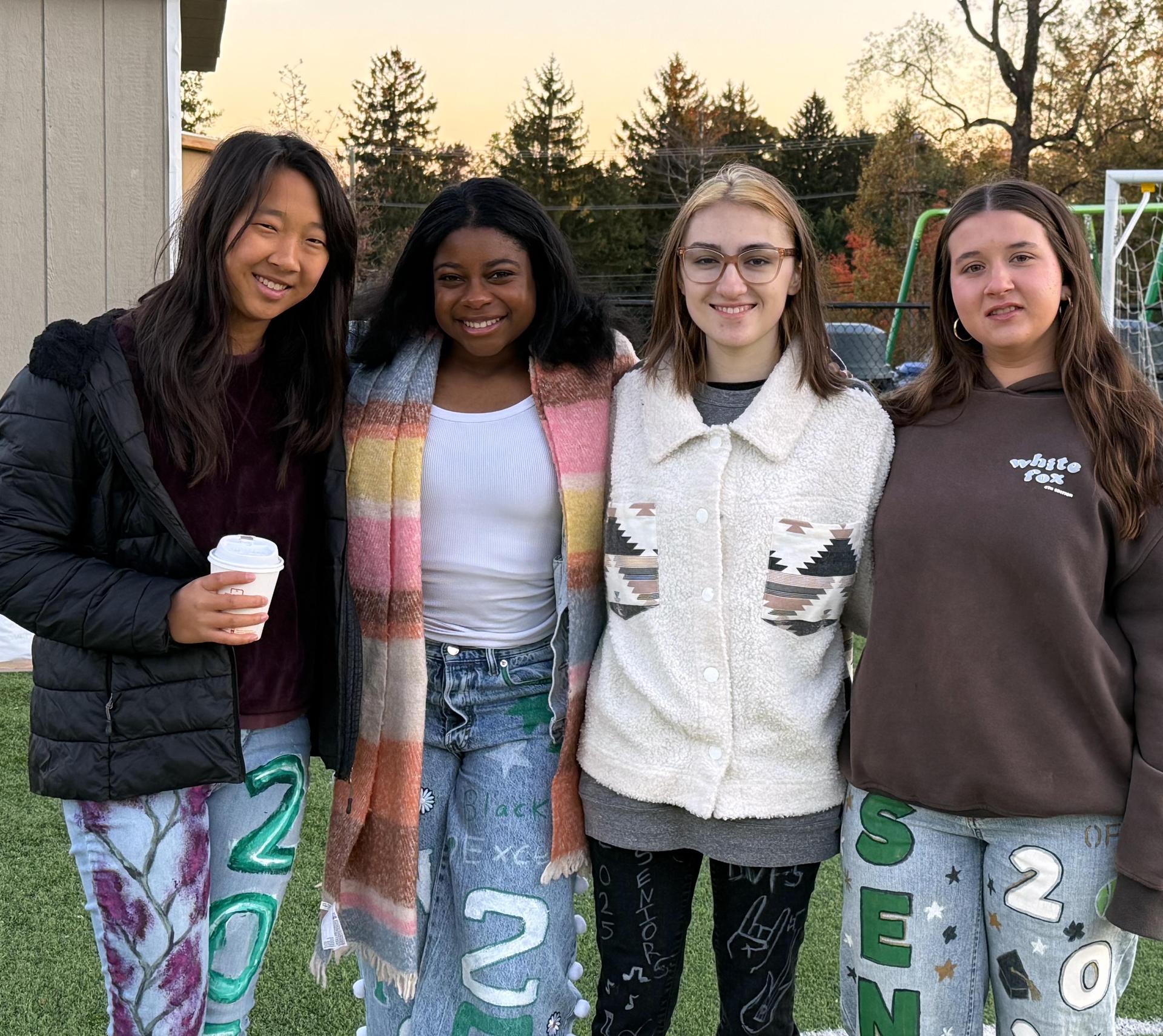 A group of senior girls celebrating together at the Senior Sunrise Breakfast