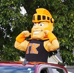 Tommy Trojan flexes his muscles in the parade.