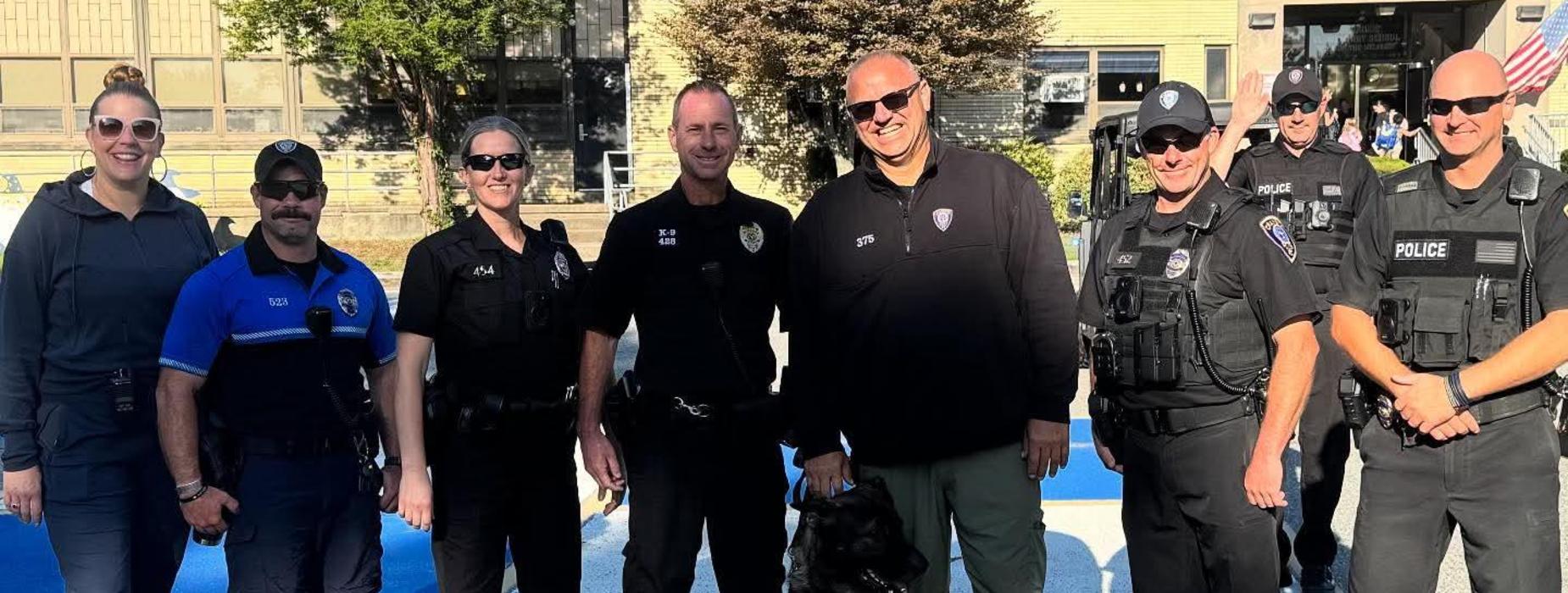 SROs pose together for Woodridge's Safe Walk to School Day