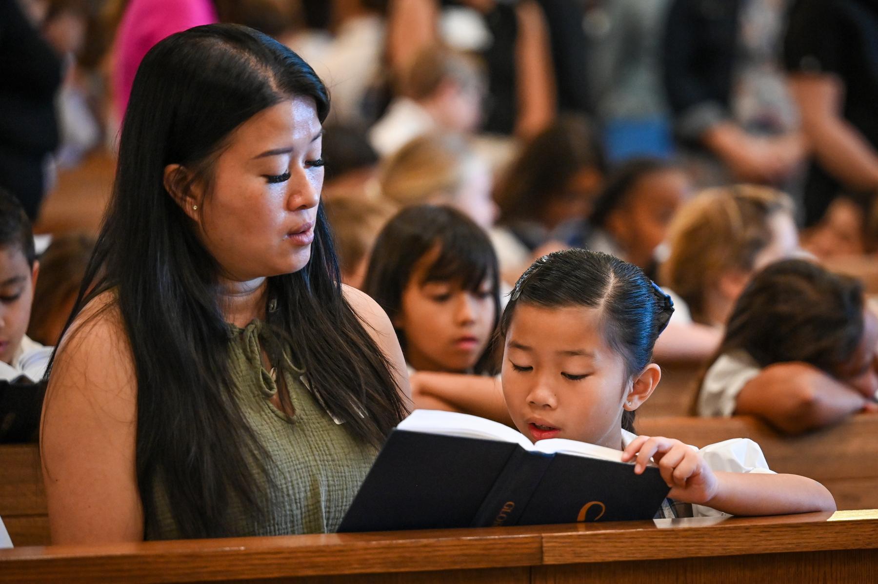 Mother and Daughter in Mass