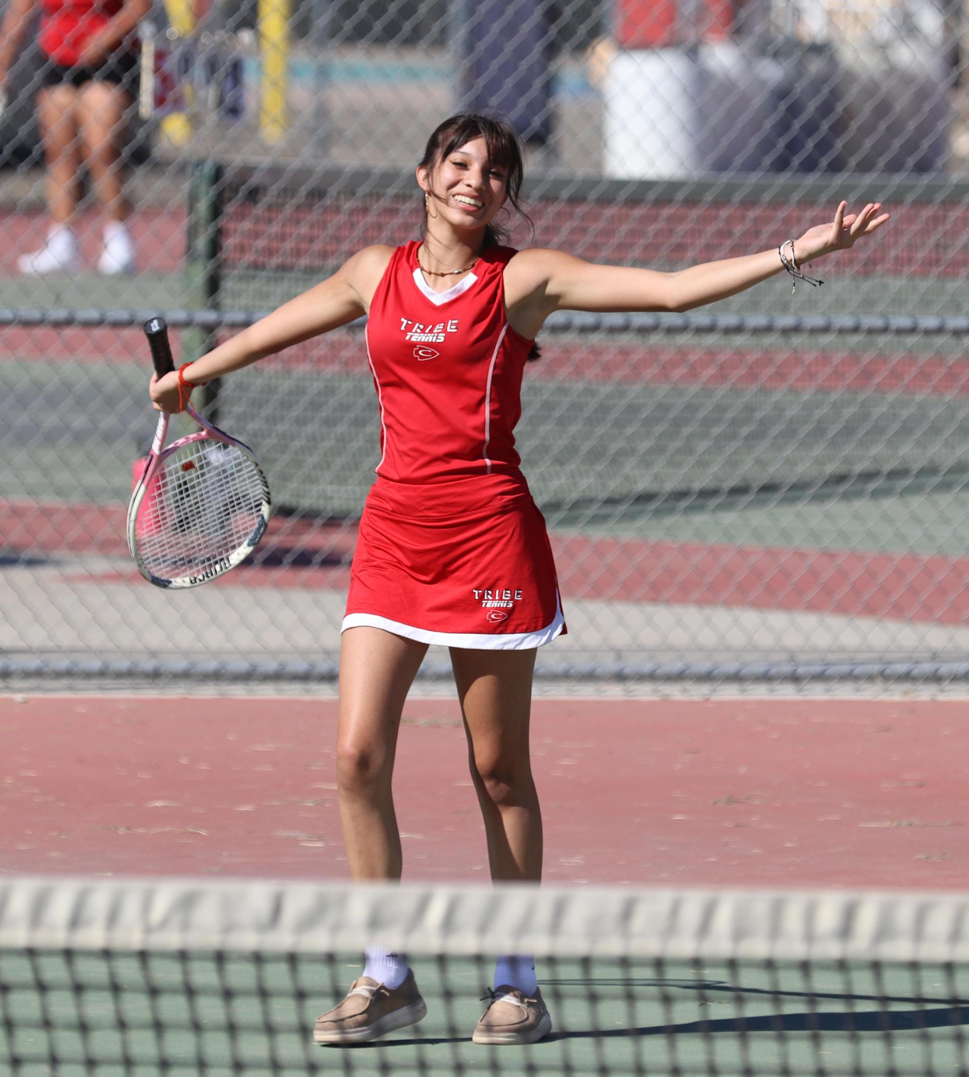 girls playing tennis against Golden Valley