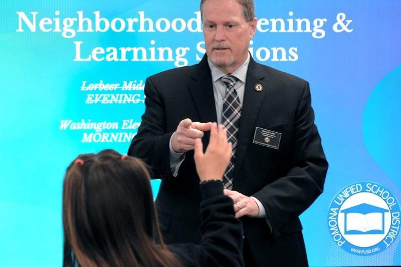 Superintendent Knowles pictured calling on a students question