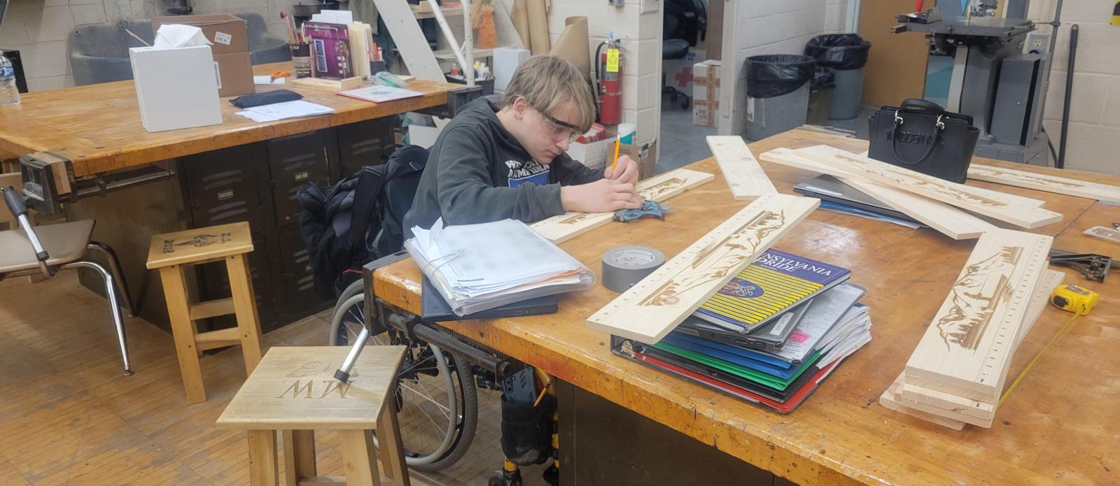 Student making bumper board.