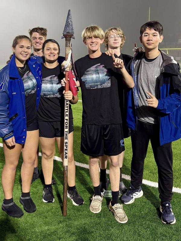 Band members posing for a photo