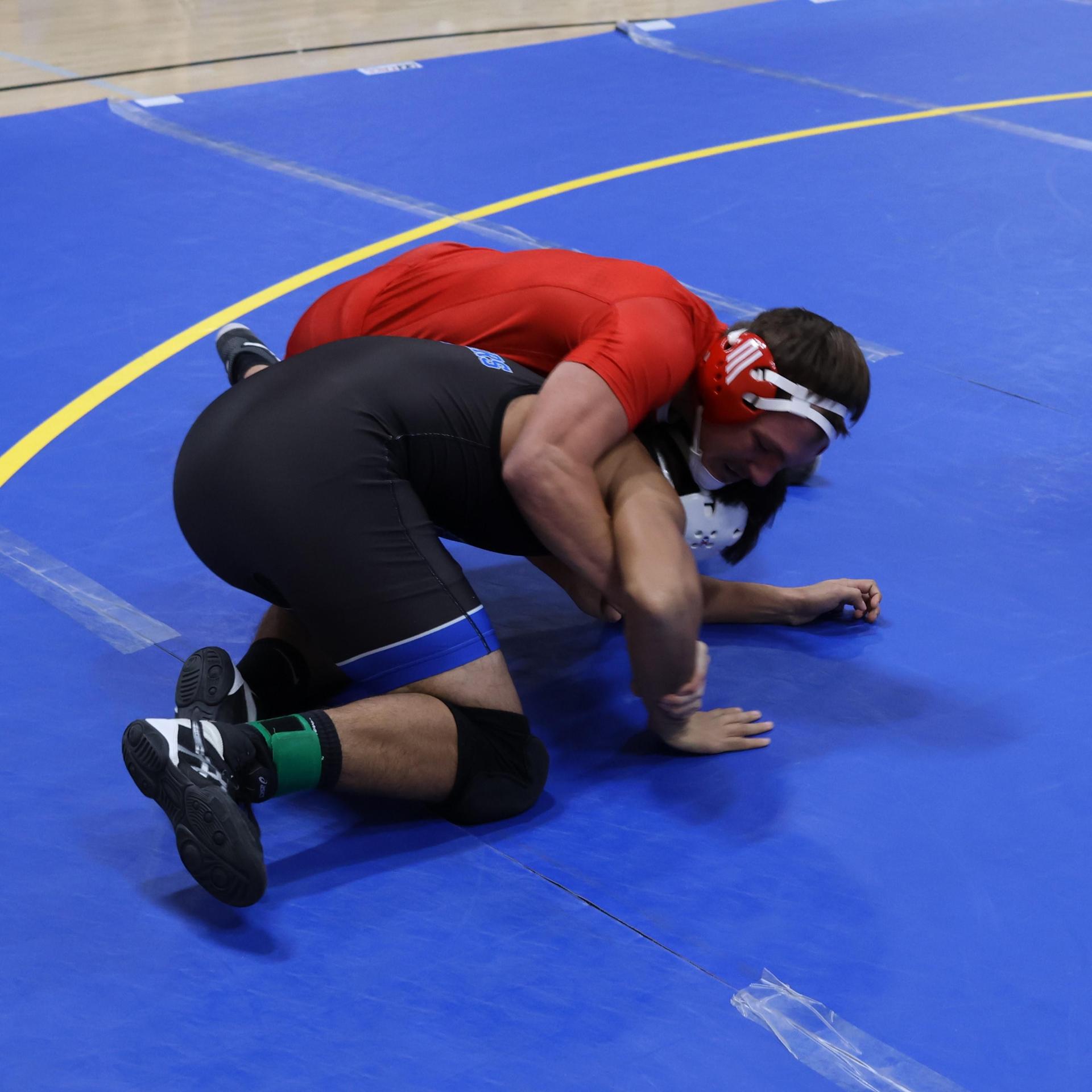 wrestlers in action at parlier