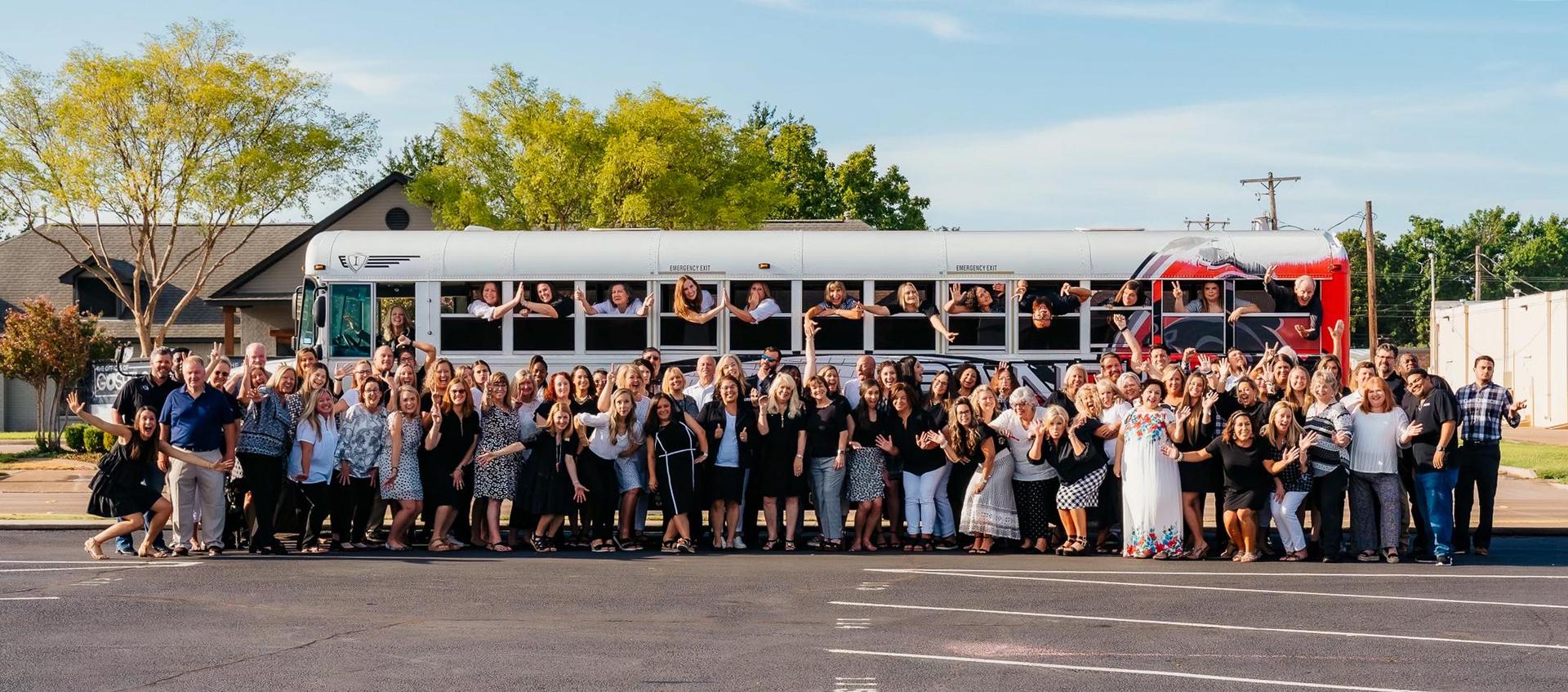 PCA Staff in front of PCA Express Shuttle Bus