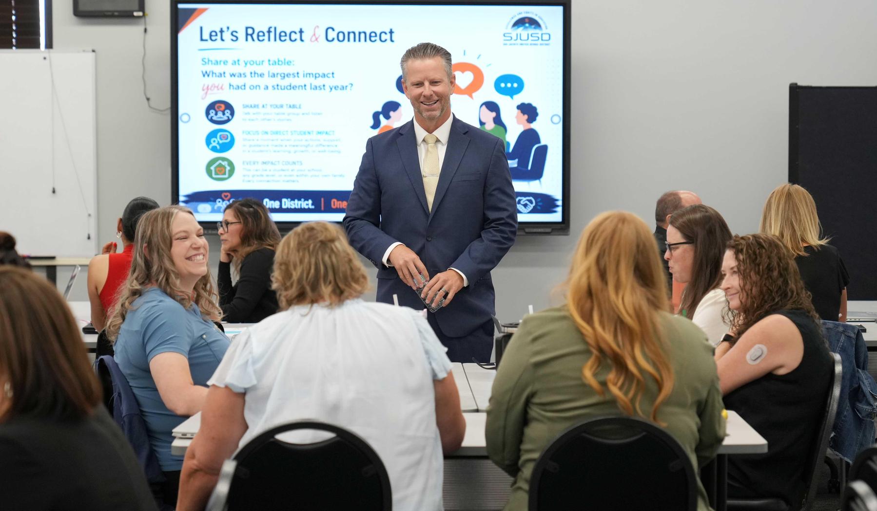 Dr Pyle in discussion group at Admin training