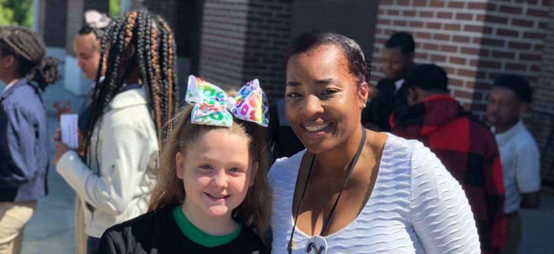 superintendent with girl student