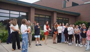 Guests gather for the ribbon cutting of the middle school greenhouse.