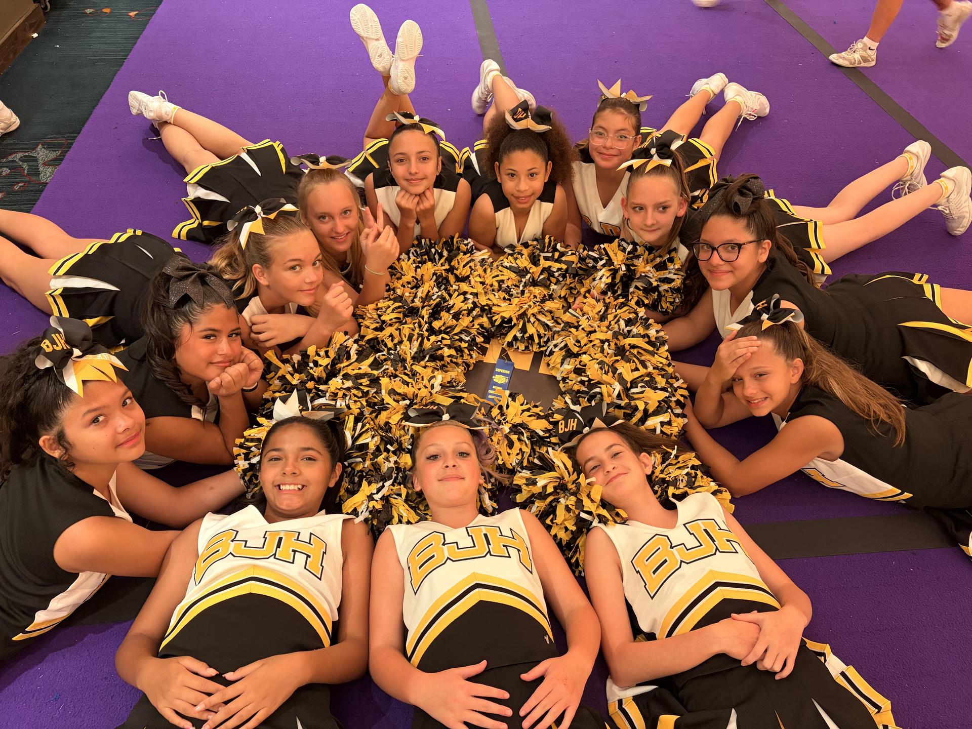 Group of Cheerleaders with awards