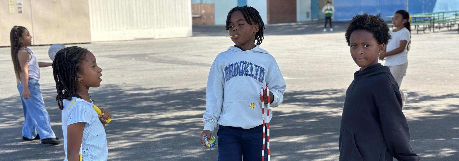 Students playing jump rope at recess