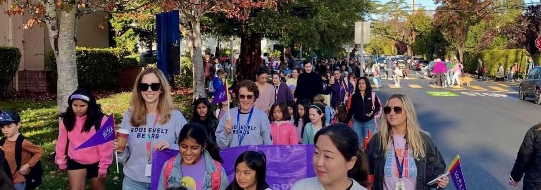 The Roosevelt community and children walking for Ruby Bridges Day
.