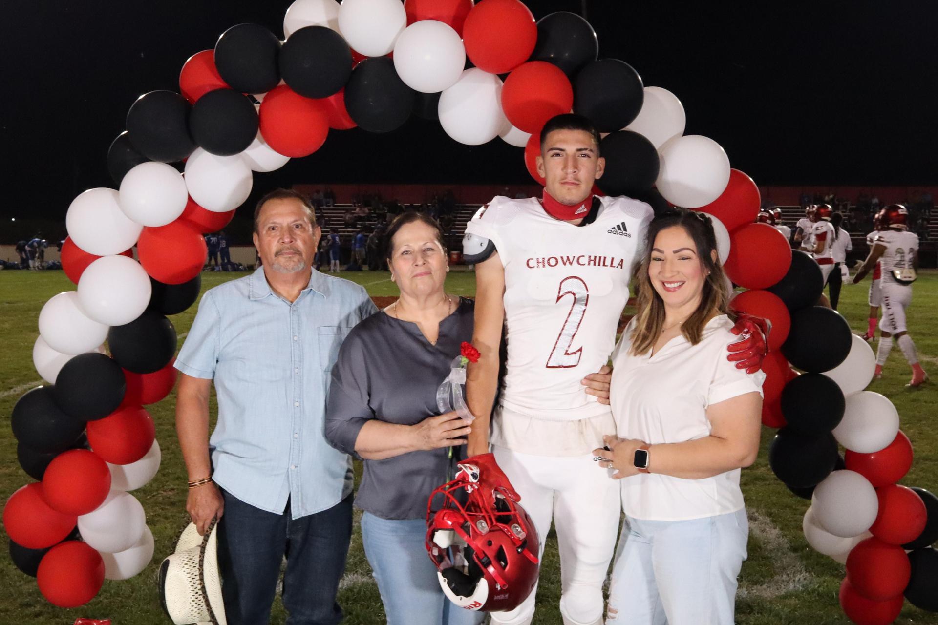 seniors and their escorts celebrating senior night