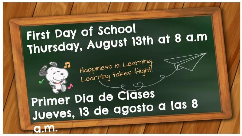 Chalkboard announcement for first day of school in English and Spanish.