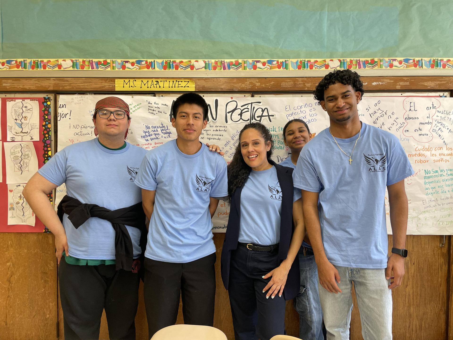 Students of A.L.A.S. posing together in class.