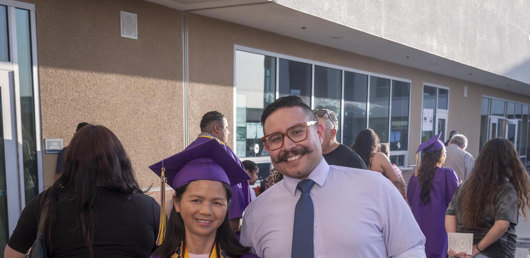 Graduate and teacher